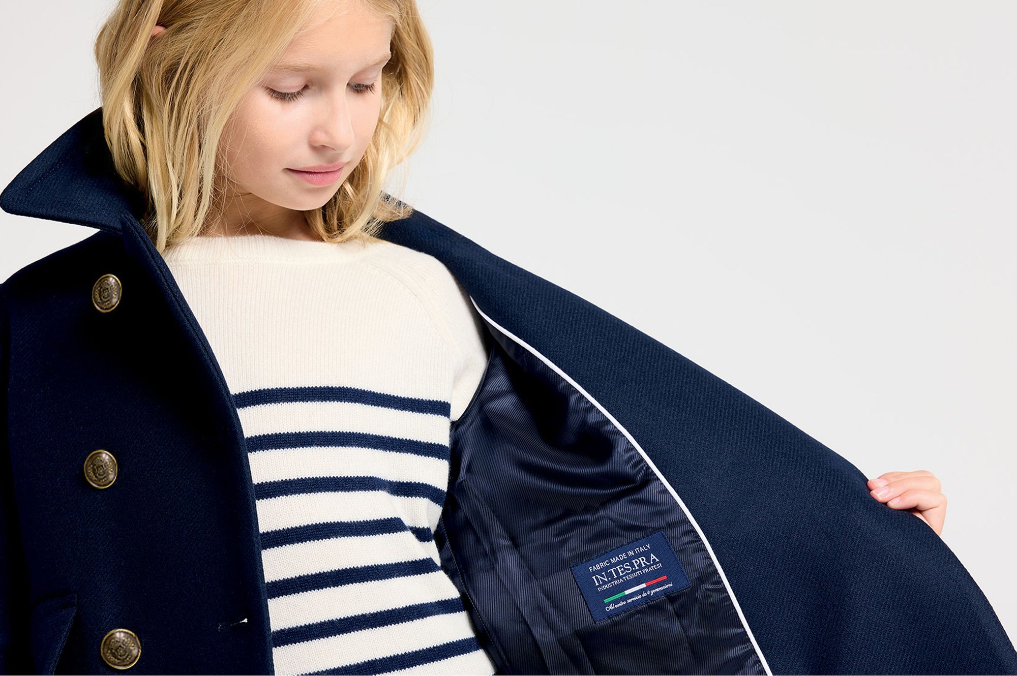 Fabrication italienne pour le manteau Melle Jacadi